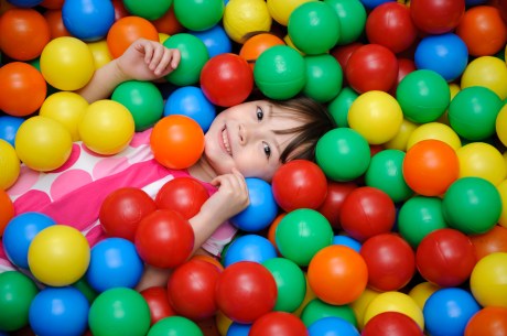 Girl in a ball pool - Special Needs Essentials
